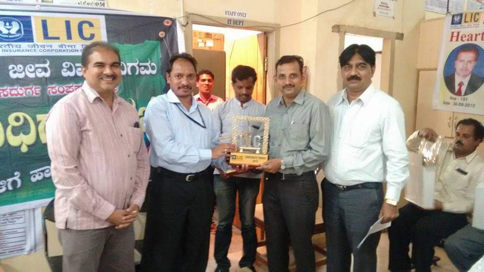 I received trophy from Marketing manager Mr,Ravi sir along with My beloved Branch Manager Muralidhar sir and Development of Naveen Kumar sir