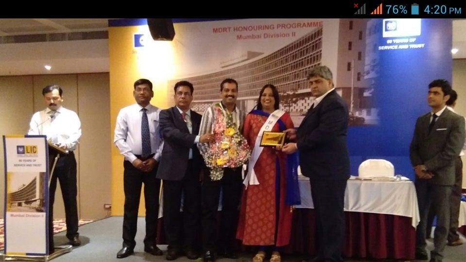 Honouring for MDRT Star of the year at Yogakshemam LIC.
