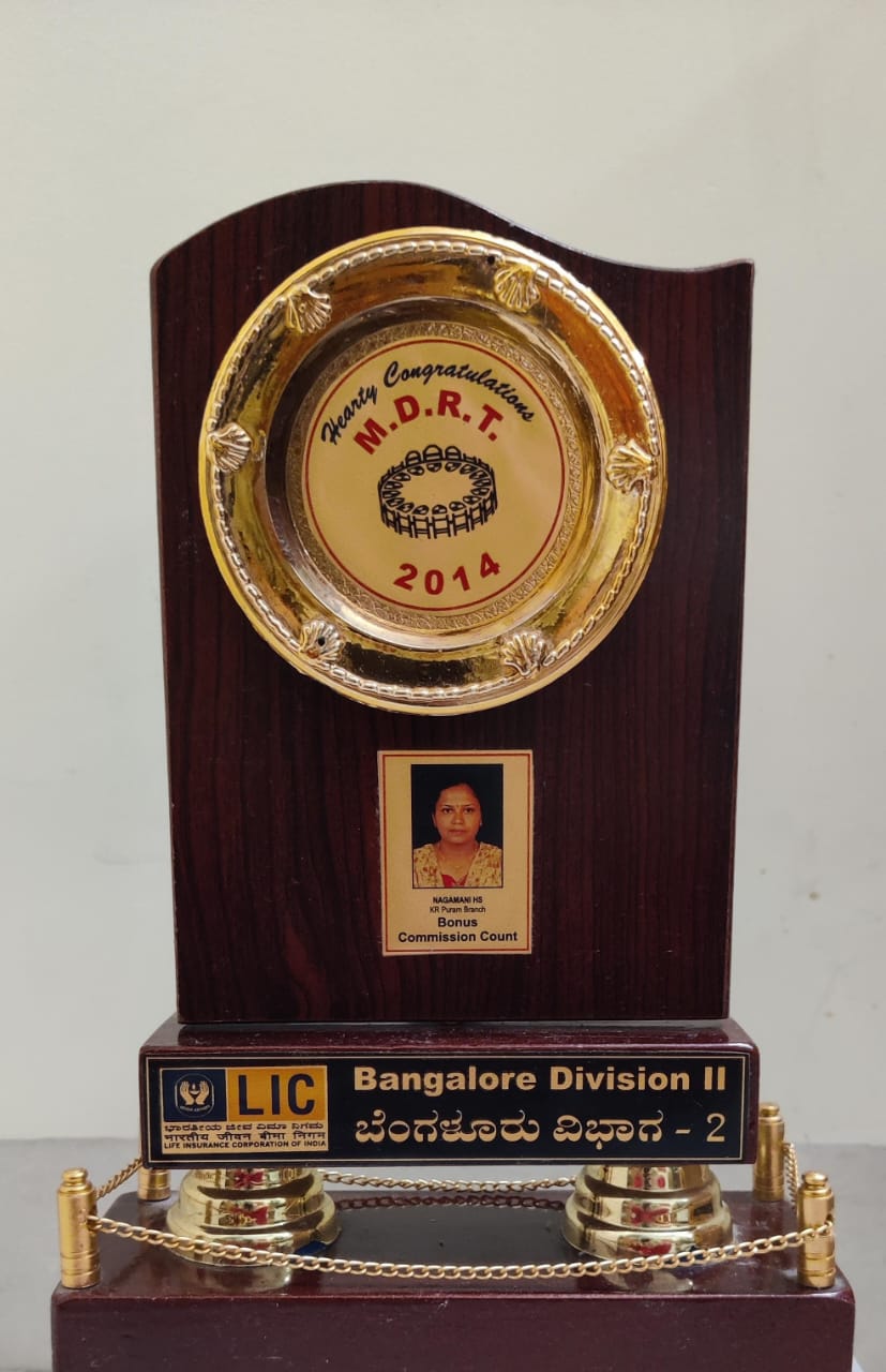 Receiving Trophy from Banglor division for MDRT 2014