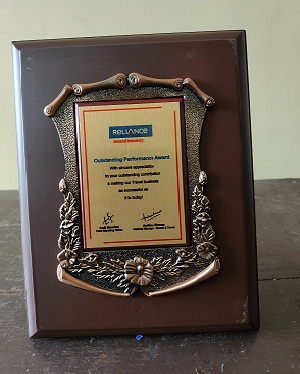 Award from Reliance for Selling Travel Insurance