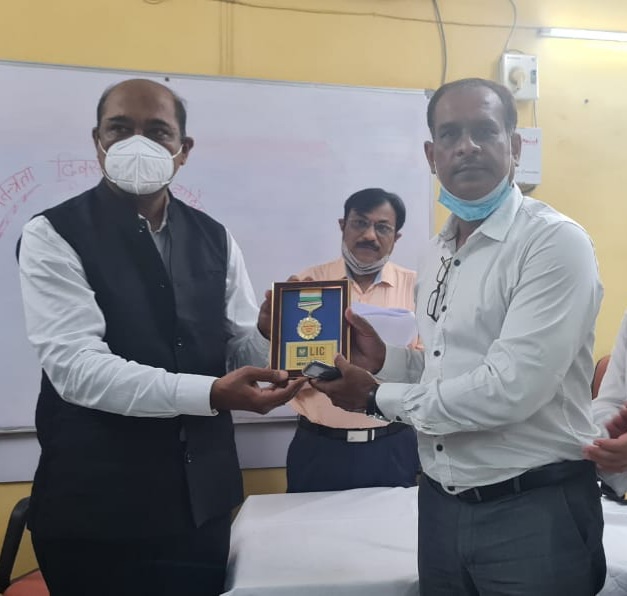 Honored with trophy for exceptional performance