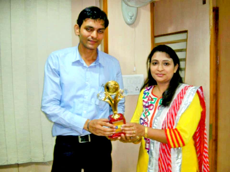 Awarded trophy for remarkable achievement