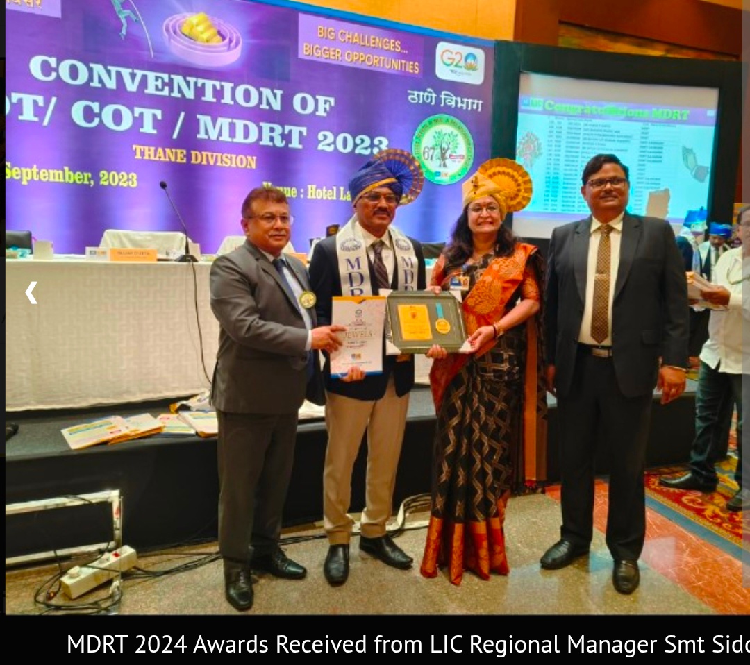 Award recd.from LIC Regional Manager at