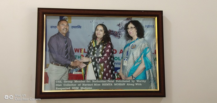 Sri. Nathubhai Patel Felicitated by  Dist. Collector Miss. Remya Mohan
