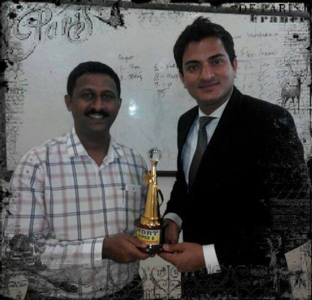 Felicitation by Mr. kazim Raza (CEO, Zaidi Corporation ) for achieving MDRT